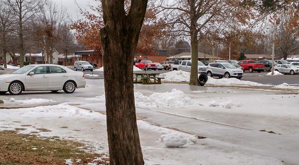 The faculty parking lot and sidewalks were still ice covered when students returned to school this week. 