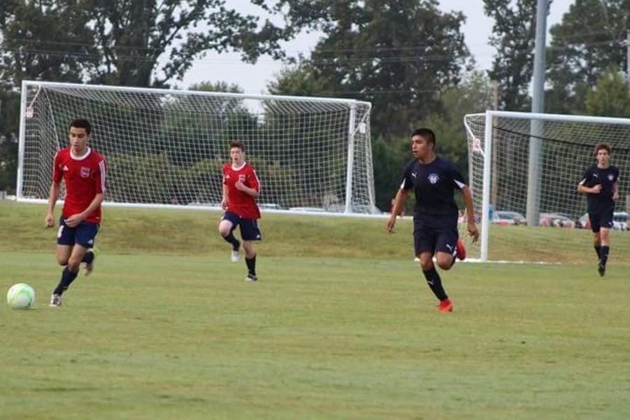 Herman Tapia (third from left) playing with the Arkansas Revolution soccer team.