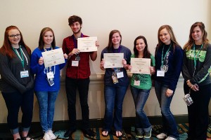 Lexie Ray, MJ Ivy, Camden Metheny, Shyla Clayton, Stephanie Atchley, Cadyn Qualls and Kensie Walker following the JEA Write-Offs award ceremony Sunday morning at the Disney Dolphin. The staff earned four individual Write-Off awards, and Hoof Prints was named ninth place in the NSPA Best of Show contest. 