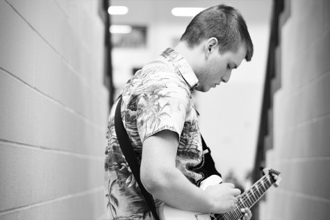 Senior Alex Matheny gets ready for his performance in the talent show. 