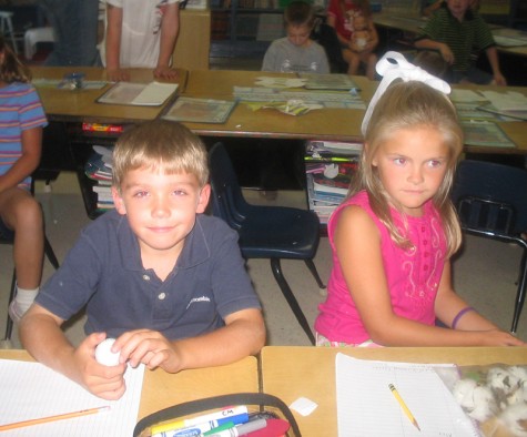 Seniors Connor Miller and Blaire Wildy work at their desks in this photo from 2005. 