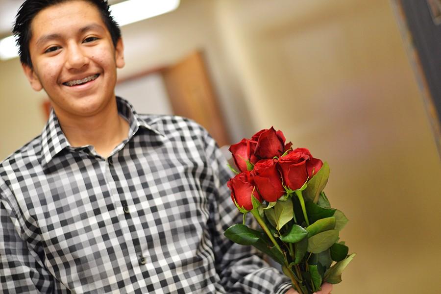 Chris Renteria handed out two dozen roses to female students and teachers today for Valentines Day.