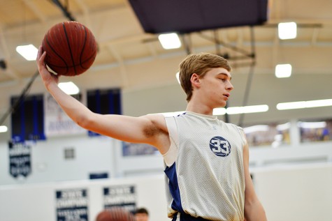 Junior Cory Turner and the rest of the Mustangs shoot around during eighth hour Friday. The teams season ended Thursday night at the district tournament in Marked Tree. 